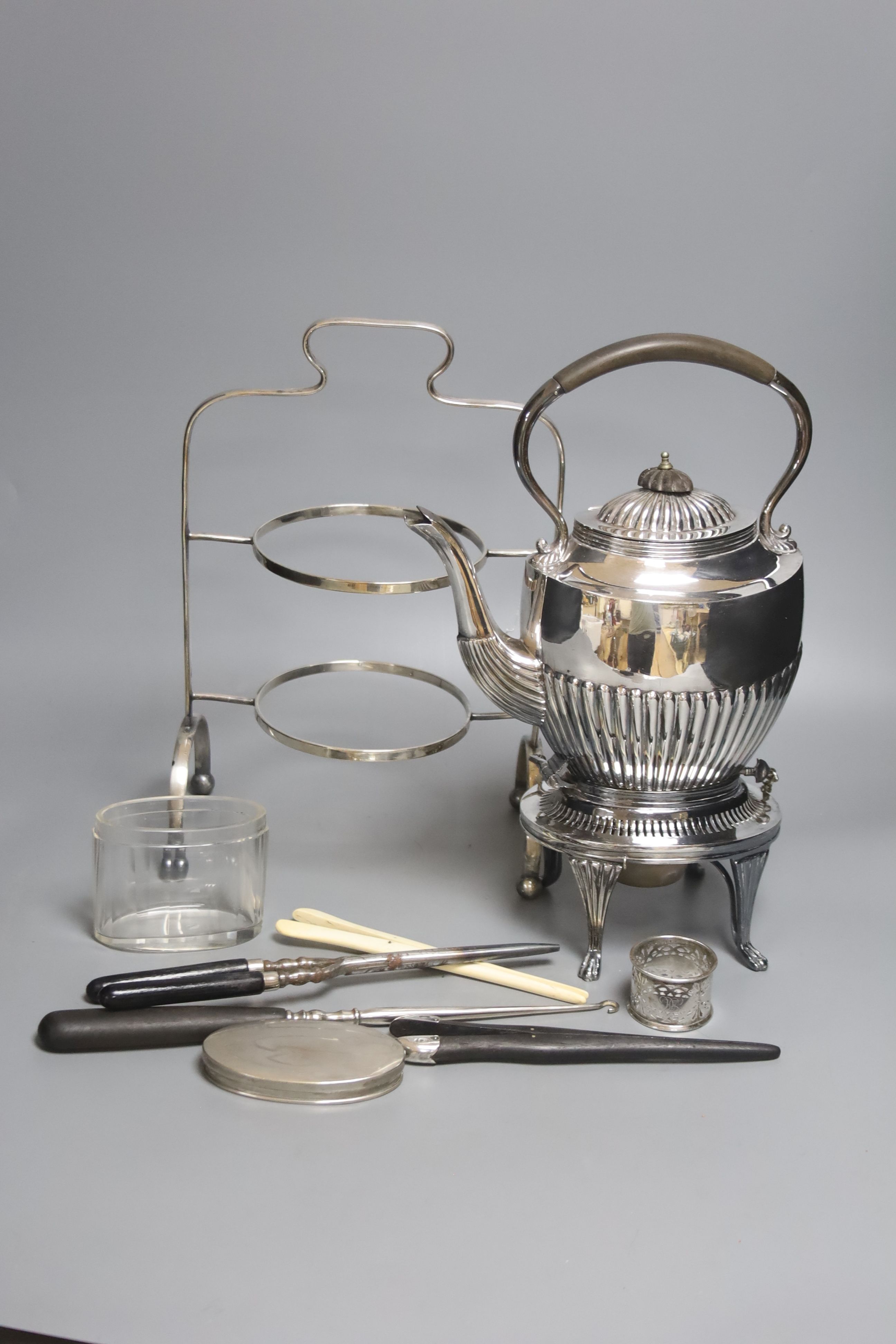 A Victorian spirit kettle, plate, frame and sundries